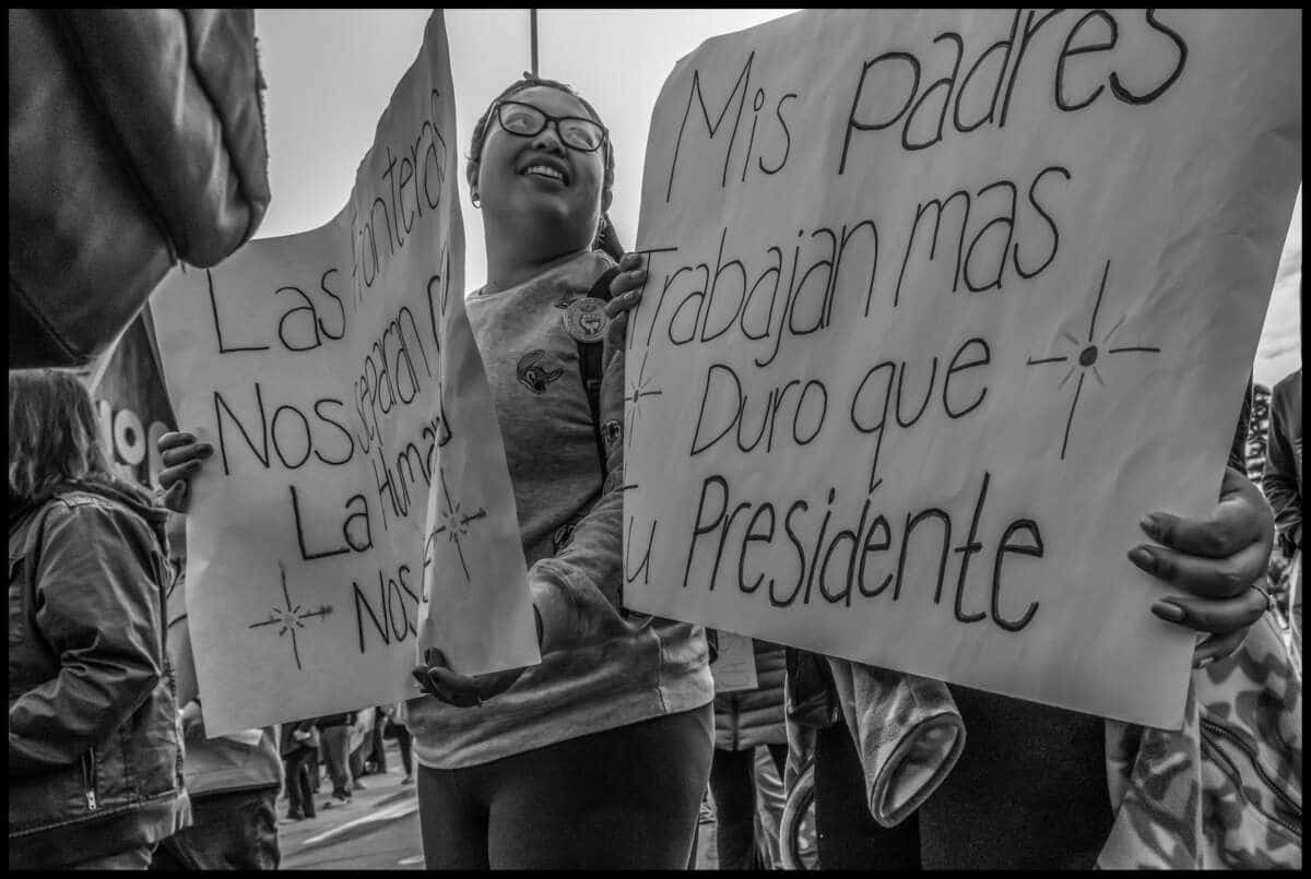 These photos capture protests against ICE and Trump’s threats of mass deportation in February 2025, in San Mateo and Fort Bragg, California.