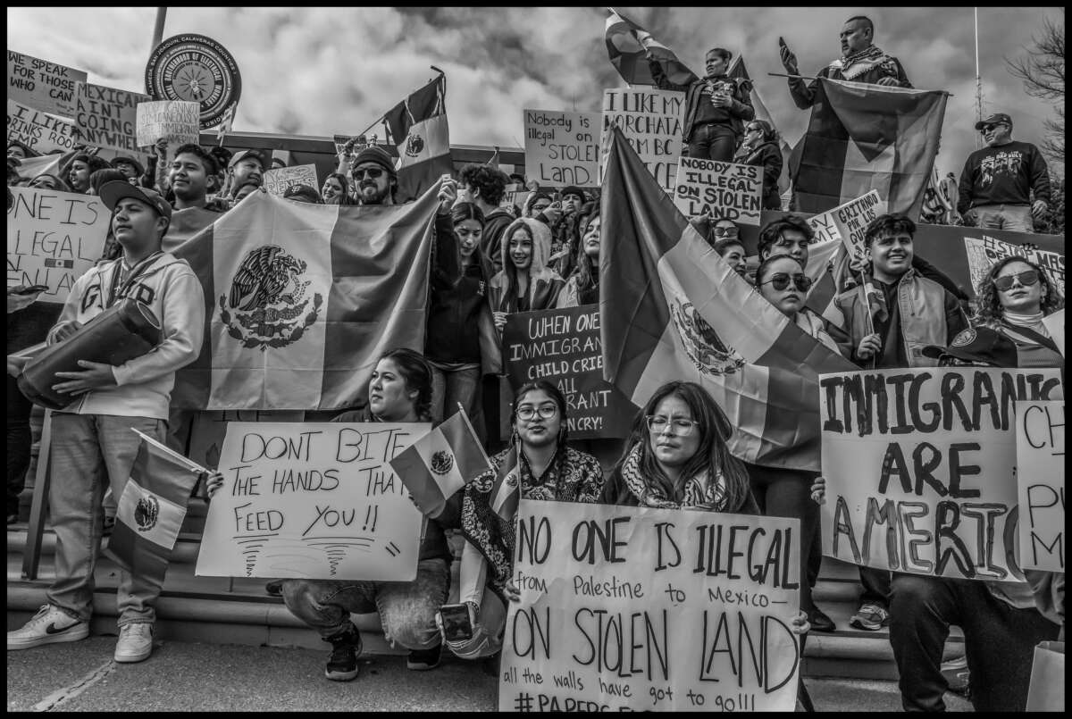 These photos capture protests against ICE and Trump’s threats of mass deportation in February 2025, in San Mateo and Fort Bragg, California.