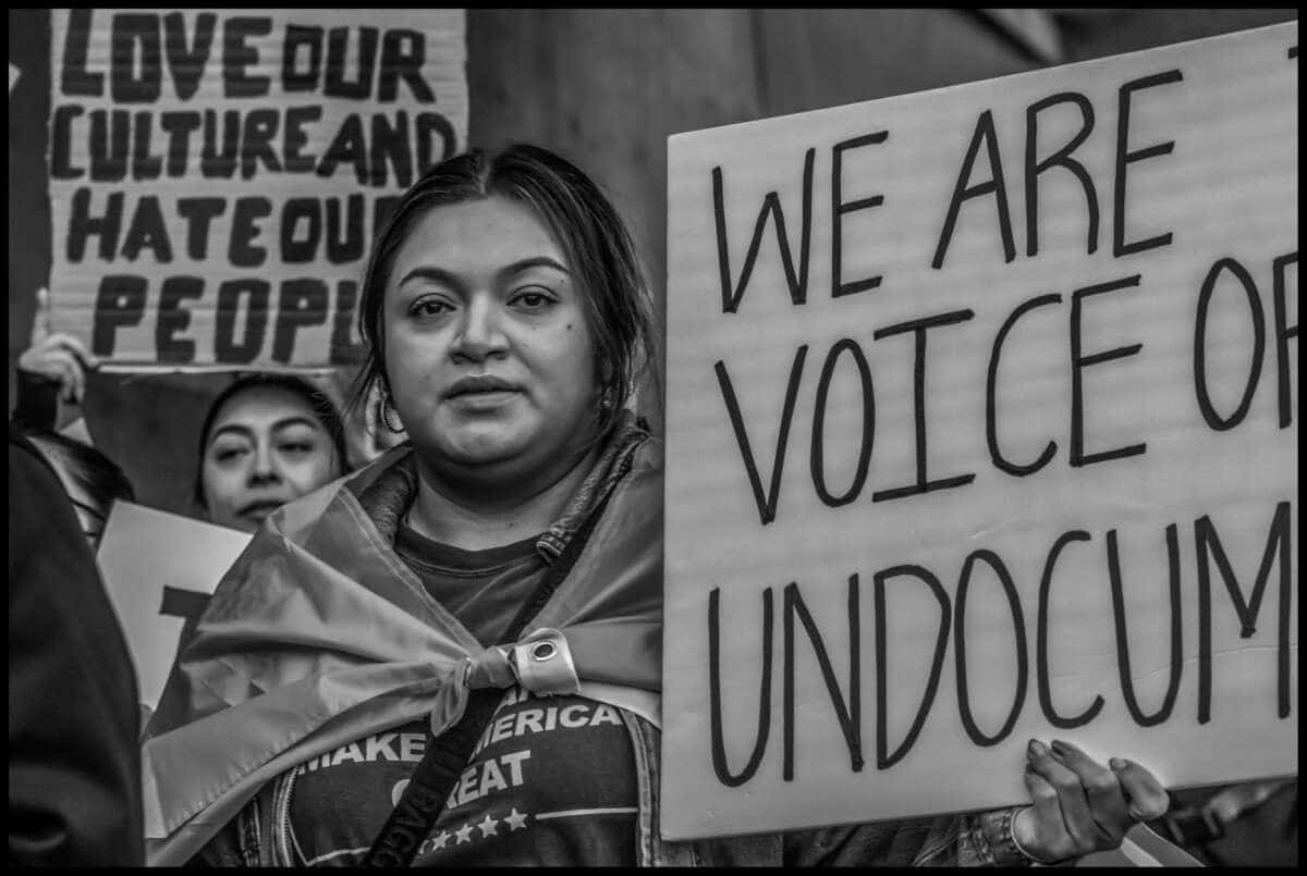 These photos capture protests against ICE and Trump’s threats of mass deportation in February 2025, in San Mateo and Fort Bragg, California.